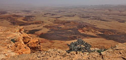 Fototapeta premium Machtesh Ramon - erosion crater in the Negev desert, the most picturesque natural landmark of Israel..&nbsp; Unearthly landscapes, geological phenomena, absolute silence.