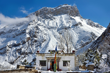 Buddhist pagoda against Snowy mountain peak