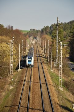 Railway double track electrified track. Railway infrastructure. Sunny weather.