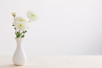 chrysanthemum in white vase