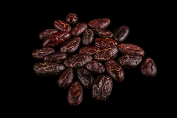 Roasted beans. Cocoa beans and coffee beans isolated on black background.