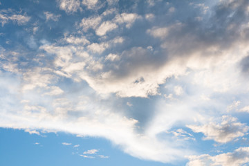 Fototapeta premium Blue sky with clouds background with sun rays