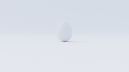 Weisses Osterei Ei versteckt auf weissem Hintergrund 