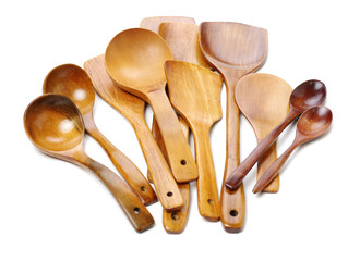 Wooden kitchen shovel and spoon on white background