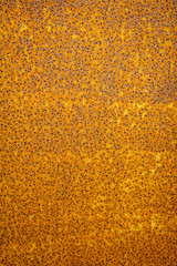 Old metal wall painted in gold color use for background