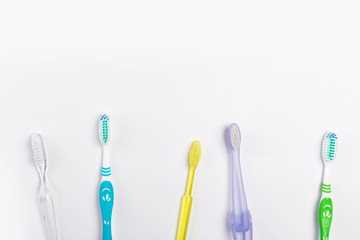 New different  toothbrushes on a white background