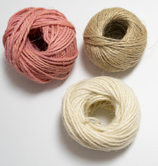 colored ball of yarn isolated in white background