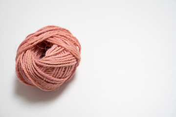 colored ball of yarn isolated in white background
