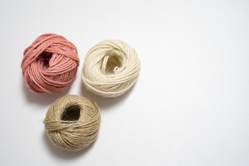 colored ball of yarn isolated in white background