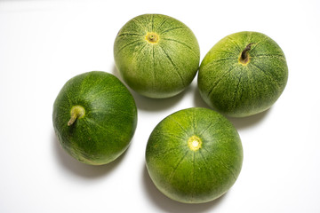 Green delicious melon isolated in white back ground looking yummy