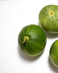 Green delicious melon isolated in white back ground looking yummy