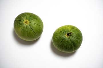 Green delicious melon isolated in white back ground looking yummy