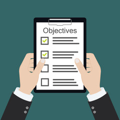 In hand. Objective board goal check list