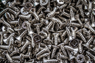 Closeup of steel screws background