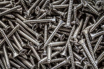 Closeup of steel screws background