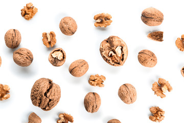 Tasty walnuts on white background