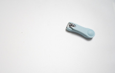 Fototapeta premium Nail clipper set, plastic and silver, isolated in white background