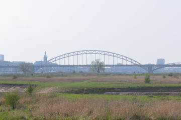 Fototapeta na wymiar The Waalbrug From The Ooijpolder