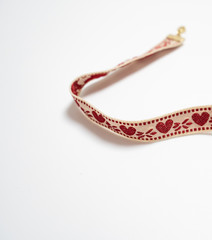 red bracelet isolated in white background