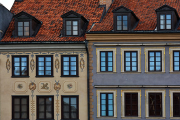 Fototapeta na wymiar Traditional and colorful building architecture in the Old Town Market Square (Rynek Starego Miasta), Warsaw, Poland.