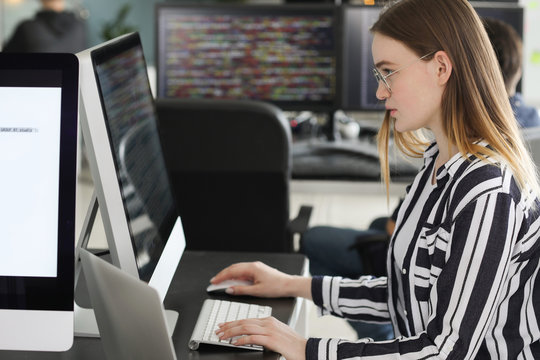 Female programmer working in office