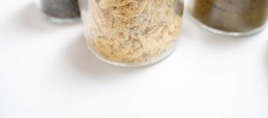 varies seasoning in galss bottle isolated in white