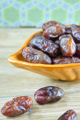 sweet algerian arabic dates fruits on a plate