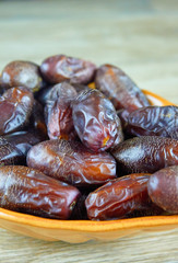 sweet algerian arabic dates fruits on a plate