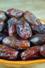 sweet algerian arabic dates fruits on a plate
