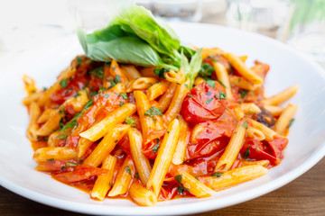 tasty pasta Italian tomato sauce pasta on the table