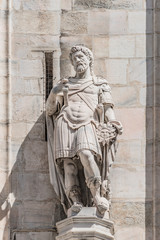 Fototapeta premium Decorative Religious figure at facade of the Cathedral of Milano, Milan, Italy