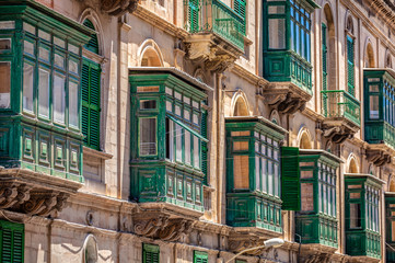 Green balconies at city Valletta, Malta