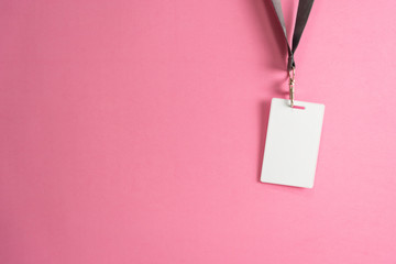 Proximity or RFID card for control security, access, protect on pink background.