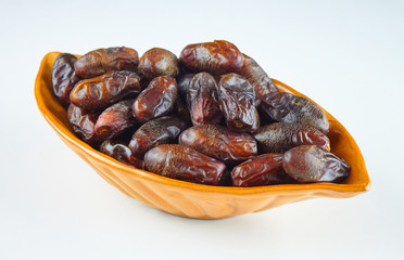 sweet algerian arabic dates fruits on a plate