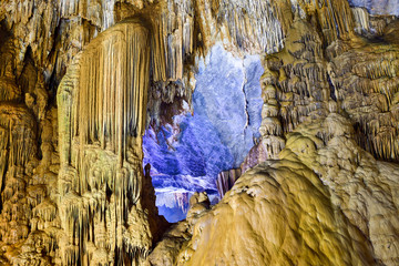 Amazing geological forms in Paradise Cave near Phong Nha, Vietnam. Limestone cave full of stalactites and stalagmites.