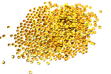 gold sequins scattered on white background