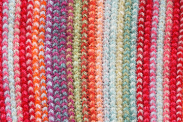 Multicolored Knitwear Sweater Fabric Texture. Bright saturated background