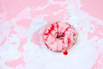 sweet donut on a white and pink background