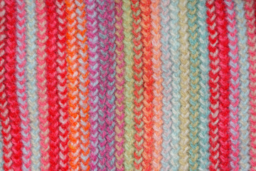 Multicolored Knitwear Sweater Fabric Texture. Bright saturated background