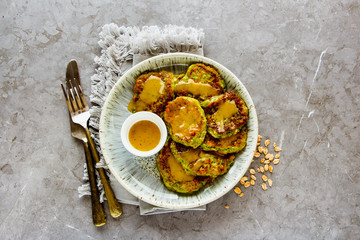 Oat and zucchini pancakes