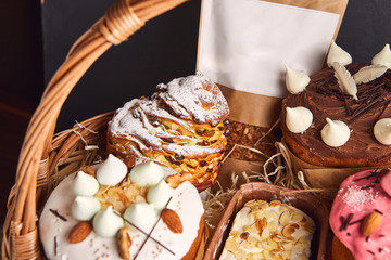 Congratulatory Easter cake in the basket, Traditional Kulich, Paska  ready for celebration
