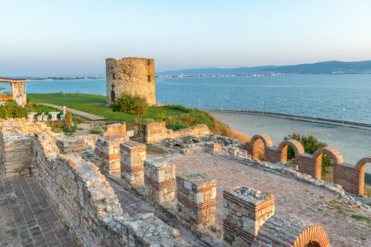 Basilica of the Holy Mother of God Eleusa and the Tower at sunrise in Nessebar ancient city. Nesebar, Nesebr is a UNESCO World Heritage Site. The ruins of an old church in Nessebar, Bulgaria