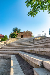 The Church of St John Aliturgetos and the Ancient Theatre in Nessebar ancient city on the Bulgarian Black Sea Coast. Nesebar or Nesebr is a UNESCO World Heritage Site. A church in Nessebar