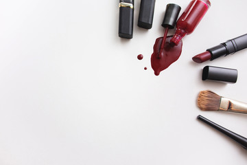 Various cosmetics on white background. On one side spase for text