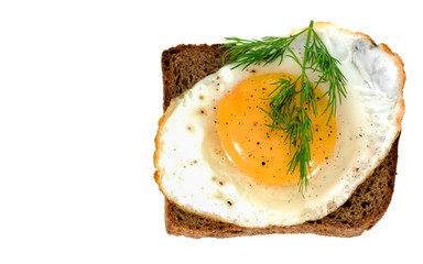 .fried egg with bread and sprinkle on white background
