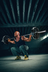 Bodybuilder Performing Barbell Squats