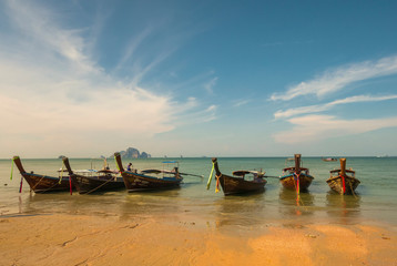 Fototapeta na wymiar Thai traditional wooden long tail boat beach sand Ao Nang, Krabi, Thailand