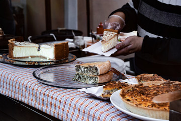 American spring market. Home bakery selling cheesecakes and pies. Holidays festival. Delicious cakes. Lifestyle.