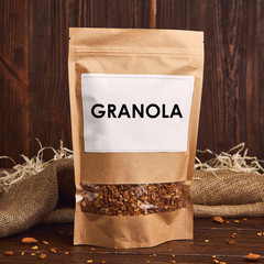 Homemade healthy granola with oats, nuts and honey in a packaging