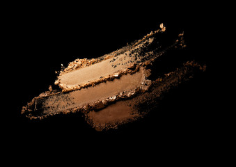 Eye shadow or bronzer neutral brown nude smudge black isolated background